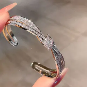 Crystal Bow Bangle Bracelet with Crossed Ribbon Design