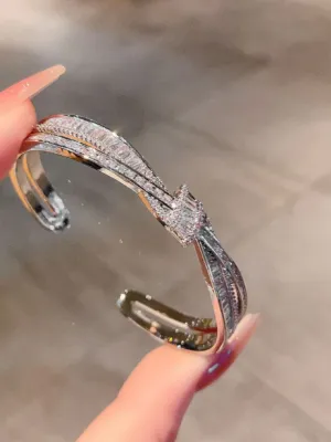 Crystal Bow Bangle Bracelet with Crossed Ribbon Design