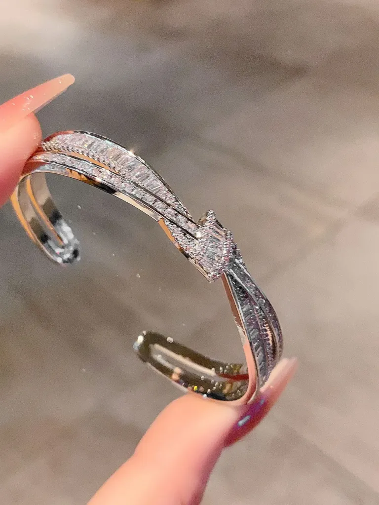 Crystal Bow Bangle Bracelet with Crossed Ribbon Design