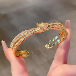 Crystal Bow Bangle Bracelet with Crossed Ribbon Design