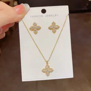 Four Petal Flower Necklace and Stud Earrings Set with Zirconia Accents Glod
