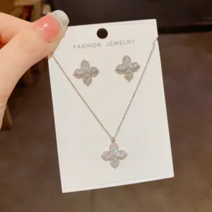 Four Petal Flower Necklace and Stud Earrings Set with Zirconia Accents Silver