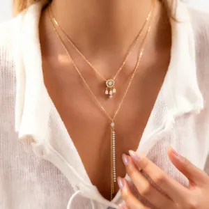 Gold Tone Crystal Pendant Necklace with Elegant Drop Details