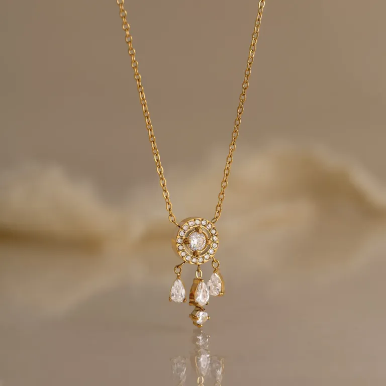 Gold Tone Crystal Pendant Necklace with Elegant Drop Details