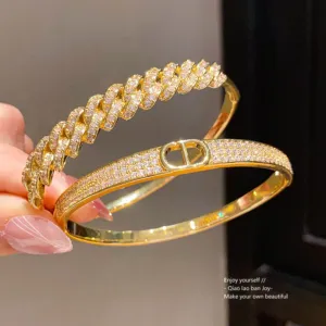 Gold Tone Zirconia Buckle Bangle with Sparkling Chain Detail
