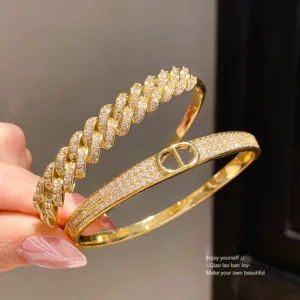 Gold Tone Zirconia Buckle Bangle with Sparkling Chain Detail