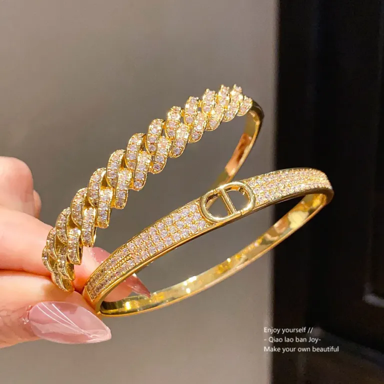 Gold Tone Zirconia Buckle Bangle with Sparkling Chain Detail