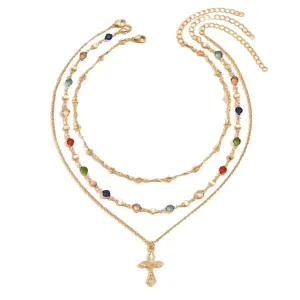 Layered Gold Tone Cross Necklace with Colorful Rhinestone Accents